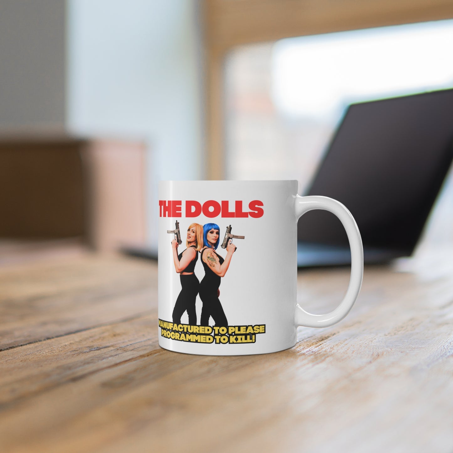The Dolls" mug
